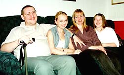 Ray Bristow enjoying his family. "When
            my health gets bad, I'm afraid I sometimes
            take it out on them." (Kingston upon
            Hull, England)