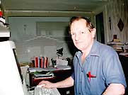 Dr. Hooper in his study checking his e-mail.
            "I often exchange e-mail with veterans."
            (Sunderland, England)