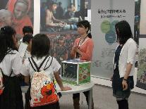 A museum staff member talks about the exhibits.